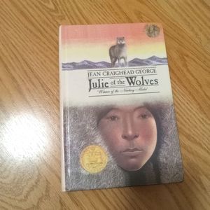 An illustrated book Julie of the wolves by Jean Craighead George